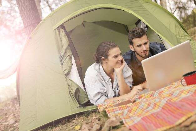 summer-content-slump-check-social-media-in-a-tent